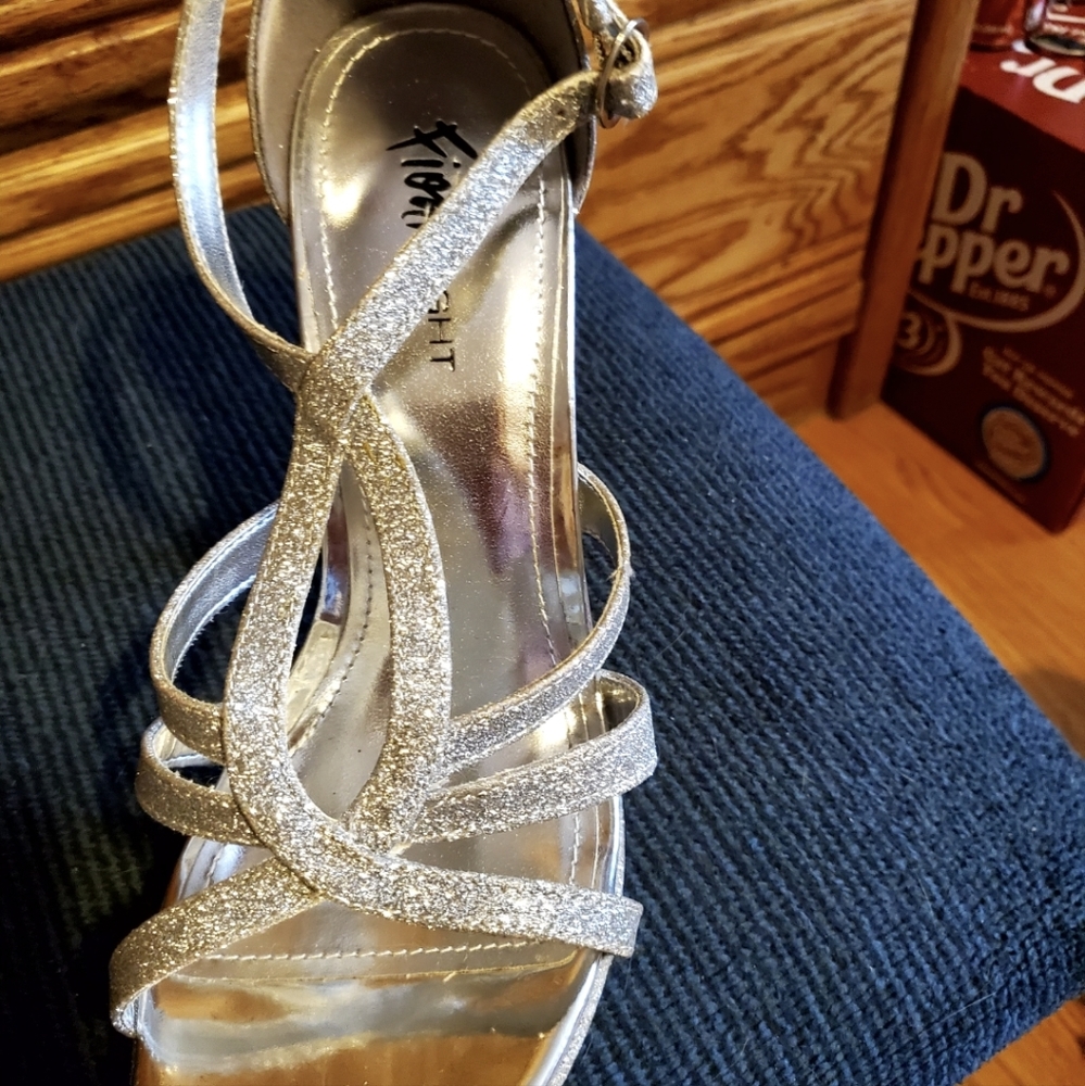 Sparkly silver dress shoes.  New.  Never used.  Size 10